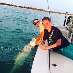 Short Drift Charters - Tarpon boatside after a drag screaming fight