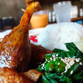 Boda - The TV in the Y Duck served with jasmine rice and broccoli raab topped with sesame seeds - Thai Near Me - Portland, Maine Boda - The TV in the Y Duck served with jasmine rice and broccoli raab topped with sesame seeds - Thai Near Me - Portland, Maine