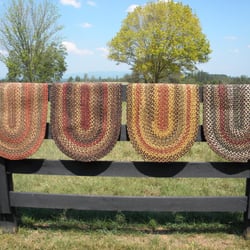 Colonial Braided Rug Company - Four examples of our "TRADEMARK" Joseph's Coat Design braided rug. Available in 100's of color combinations. Every rug is unique.