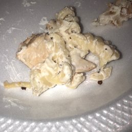 a piece of pizza on a paper plate a piece of pizza on a paper plate