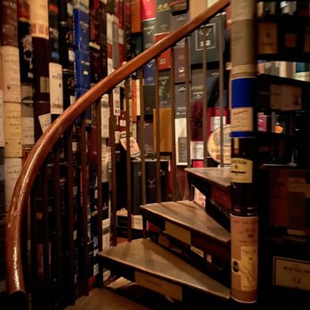 Brandy Library - Staircase to downstairs room - New American Near Me - New York, New York Brandy Library - Staircase to downstairs room - New American Near Me - New York, New York