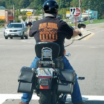Bojangles - a man riding a motorcycle on a city street - Fast Food Near Me - Bristol, Tennessee Bojangles - a man riding a motorcycle on a city street - Fast Food Near Me - Bristol, Tennessee