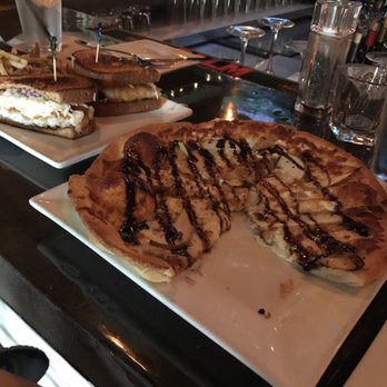 Parker. Eatery & Bar - Caramelized onion and pear pizza, fish and chips sandwich with truffle fries. - New American Near Me - Shelton, Connecticut Parker. Eatery & Bar - Caramelized onion and pear pizza, fish and chips sandwich with truffle fries. - New American Near Me - Shelton, Connecticut