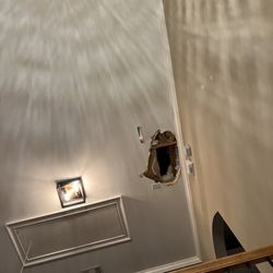 Metro Concepts - Before picture of hole in ceiling.
