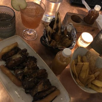 Chubby's Jamaican Kitchen - From left to right: slow baked jerk wings, pepper shrimp, spicy chips - Caribbean Near Me - Toronto, Ontario