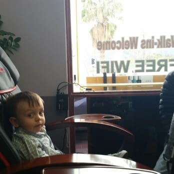 Uptown Spa - 2 year old sitting next to mom in massage chair - Nail Salons Near Me - La Crescenta, California Uptown Spa - 2 year old sitting next to mom in massage chair - Nail Salons Near Me - La Crescenta, California