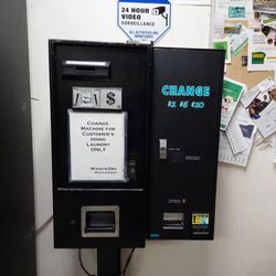 wash n dry - Two change machines, and there's a third one in the back.