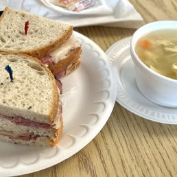 #1 Triple Decker-Corned Beef, Pastrami, Swiss, Cole Slaw & Russian Dressing & Matzo Ball Soup #1 Triple Decker-Corned Beef, Pastrami, Swiss, Cole Slaw & Russian Dressing & Matzo Ball Soup