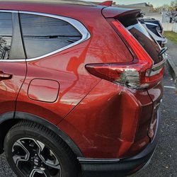 Five J's Automotive - Quarete panel damaged with the tail light and bumper. Before