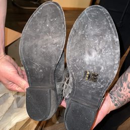 Scuffed up bottoms on "brand new" $300 boots...
