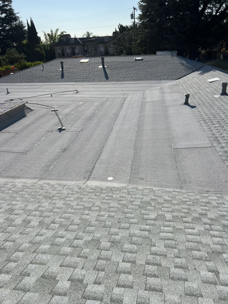 Slide of JVR Quality Roofing