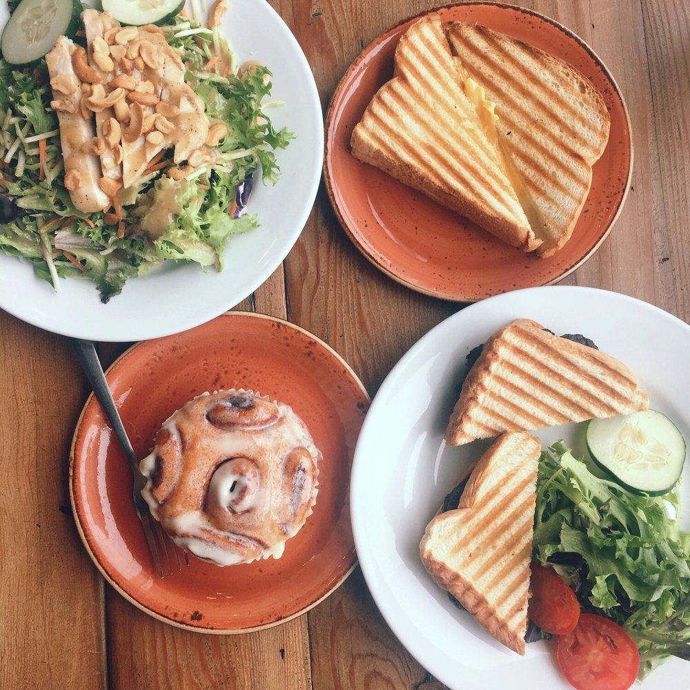 Milltown Coffee - Thai chicken salad, grilled cheezie, cinnamon roll, vegetarian black bean burger. - Coffee & Tea Near Me - Moline, Illinois Milltown Coffee - Thai chicken salad, grilled cheezie, cinnamon roll, vegetarian black bean burger. - Coffee & Tea Near Me - Moline, Illinois
