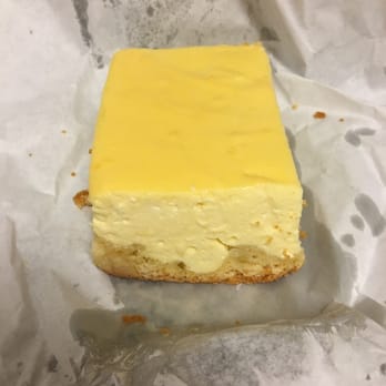 Waltos Bakery - a piece of cheesecake on a piece of wax paper - Bakeries Near Me - Brooklyn, New York Waltos Bakery - a piece of cheesecake on a piece of wax paper - Bakeries Near Me - Brooklyn, New York