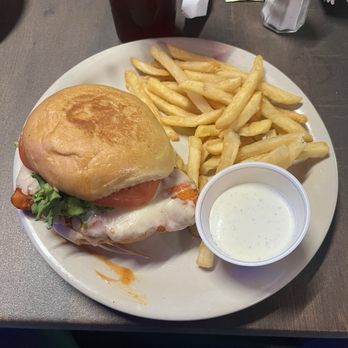 GuadalaHARRY's Bar & Grill - Buffalo Chicken Sandwich on a Sourdough bun with fries - Cocktail Bars Near Me - Conroe, Texas