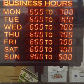 Backgate One Stop, Inc - hours of operation posted in window - American Near Me - Dumas, Arkansas