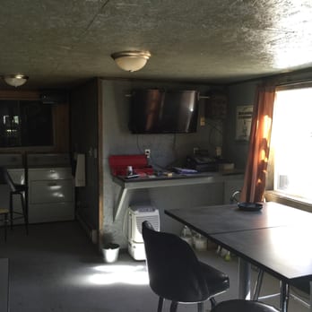 Twilite Zone - Large Heated Smoking Room with TV and even laundry do your laundry while you have a beer!! - Sports Bars Near Me - Stanley, Wisconsin