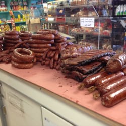 The Commissary - Sausage and other smoked meats fresh out of the smokehouse.