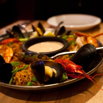 Scrumptious Occasions Catering - Chef Munther's famous paella. - Caterers Near Me Scrumptious Occasions Catering - Chef Munther's famous paella. - Caterers Near Me