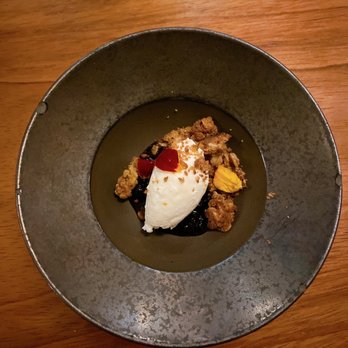Ariana Restaurant - a dessert in a bowl on a wooden table - French Near Me - Bend, Oregon Ariana Restaurant - a dessert in a bowl on a wooden table - French Near Me - Bend, Oregon