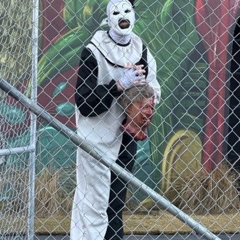 Halloween Horror Nights - Art the Clown in front of the Terrifer maze - Haunted Houses Near Me - Los Angeles, California Halloween Horror Nights - Art the Clown in front of the Terrifer maze - Haunted Houses Near Me - Los Angeles, California