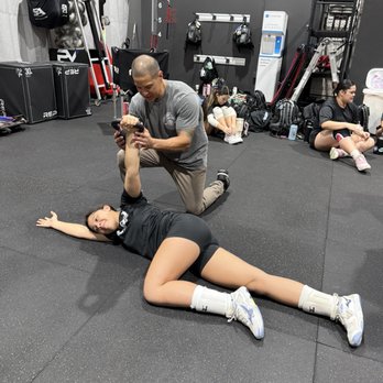 Kettlebuilt Hawaii - Hoku coaching kettlebell arm bar - Trainers Near Me
