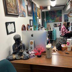 This Is the Place Tattoo - Front desk.