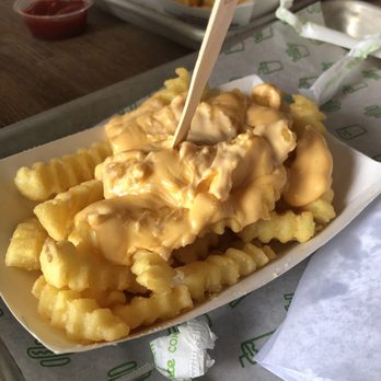 Shake Shack Westport - Cheese-cemented crinkle cut fries at Shake Shack - Burgers Near Me - Westport, Connecticut