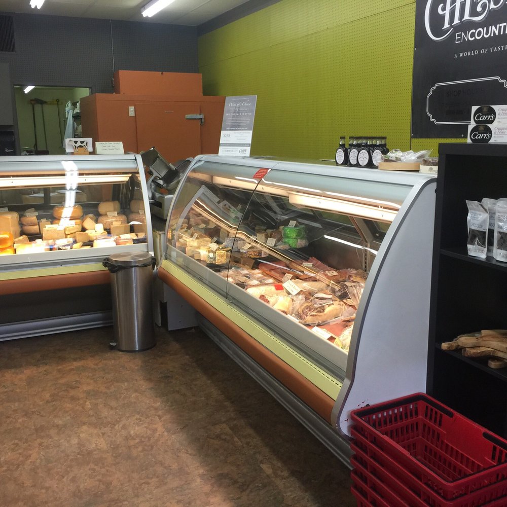 Cheese Encounter - a variety of cheeses in a display case - Cheese Shops Near Me - Thunder Bay, Ontario Cheese Encounter - a variety of cheeses in a display case - Cheese Shops Near Me - Thunder Bay, Ontario