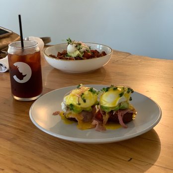 White Rhino Coffee - Hash brown benedict (front), sweet potato hash (back), cold brew - Coffee & Tea Near Me - Dallas, Texas White Rhino Coffee - Hash brown benedict (front), sweet potato hash (back), cold brew - Coffee & Tea Near Me - Dallas, Texas