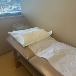 Michigan Orthopedic Institute - Exam table. Sorry that I crinkled the paper. It was definitely nest upon entry!