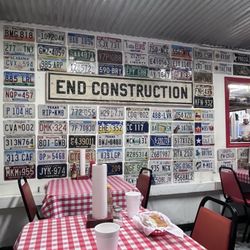 License plates line the wall.