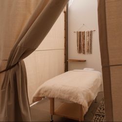 The NOW Massage Boulder - Journey room. Ocean sounds. High ceilings. Like a cabana on a beach!
