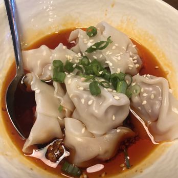 Duck n Bao - A13. Hot Oil Wontons House Made Pork Wontons with Chefs Special Chili Oil - Szechuan Near Me - Cypress, Texas Duck n Bao - A13. Hot Oil Wontons House Made Pork Wontons with Chefs Special Chili Oil - Szechuan Near Me - Cypress, Texas