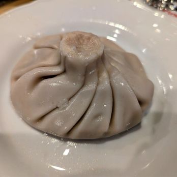 ARAGVI Restaurant - Khinkali is filled with meat and a broth.  Traditionally  pick it up and bite the top, then drink the broth, and then eat the dumpling. - Salad Near Me - PALATINE, Illinois