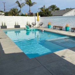 a pool and a bench a pool and a bench