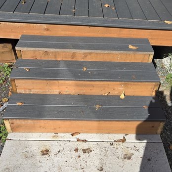 Simplified Construction - The stairs were supposed to wrap around the entire deck. This is all we got. Looks like a 3rd grader was given the task. - Decks & Railing Near Me Simplified Construction - The stairs were supposed to wrap around the entire deck. This is all we got. Looks like a 3rd grader was given the task. - Decks & Railing Near Me