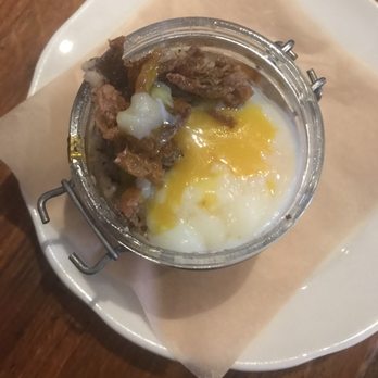 The Cookery - EGGS IN A JAR stone ground polenta, poached egg, chili dipped crispy pork - Italian Near Me - Dobbs Ferry, New York The Cookery - EGGS IN A JAR stone ground polenta, poached egg, chili dipped crispy pork - Italian Near Me - Dobbs Ferry, New York