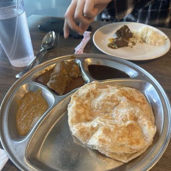 PappaRich - Roti with chicken curry. Roti was good but the chicken was dry. - Malaysian Near Me - Houston, Texas