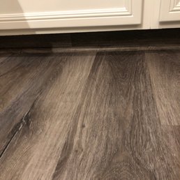 Under the kitchen cabinets. Under the kitchen cabinets.