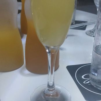 Souffle Bistro & Bar - Pineapple mimosa - Southern Near Me - Arlington, Texas Souffle Bistro & Bar - Pineapple mimosa - Southern Near Me - Arlington, Texas