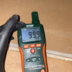 Howard Environmental - moisture meter reading in cedar park