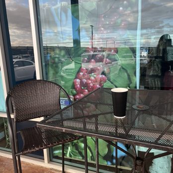 Kona Mountain Coffee - Large coffee at outdoor table - Coffee & Tea Near Me - Kailua-Kona, Hawaii Kona Mountain Coffee - Large coffee at outdoor table - Coffee & Tea Near Me - Kailua-Kona, Hawaii