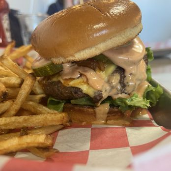 Charred Foods - Cheeseburger with grilled onions and fried - Burgers Near Me - Herndon, Virginia Charred Foods - Cheeseburger with grilled onions and fried - Burgers Near Me - Herndon, Virginia