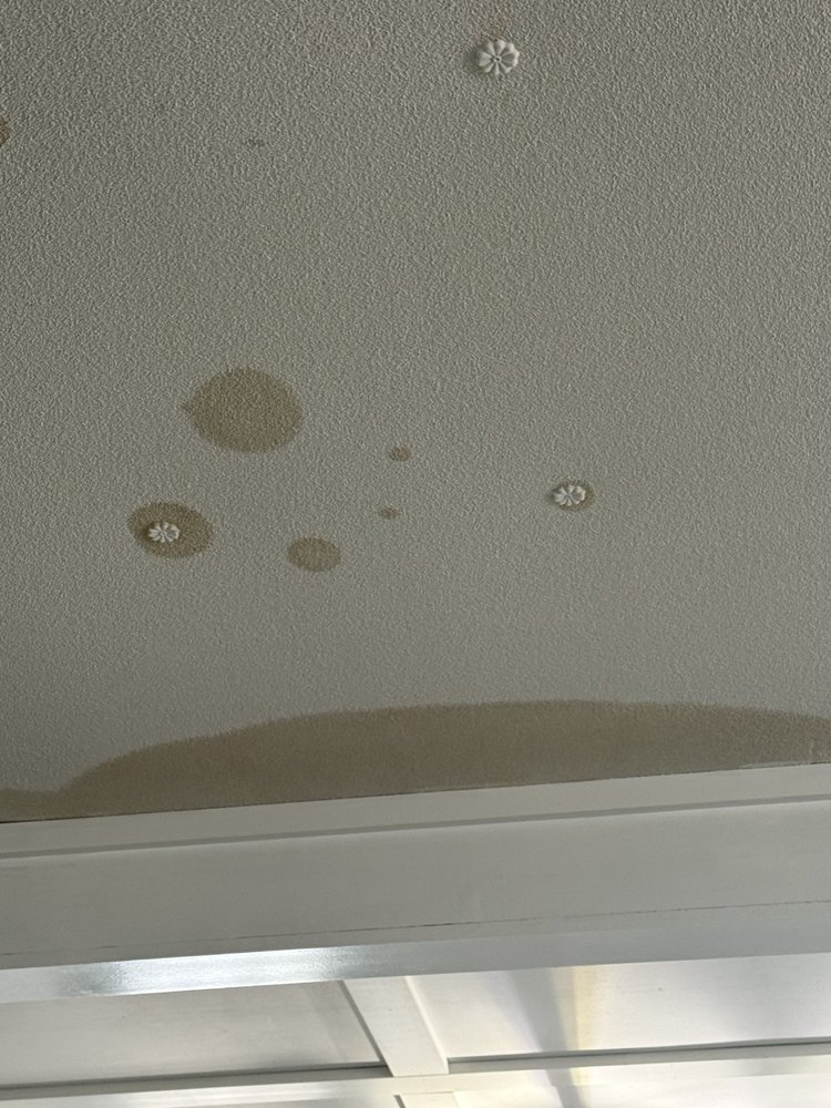 Slide of All Weather Roofing