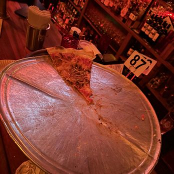 Dino's Tomato Pie - I took this picture to prove I we left at least one piece.  I literally ate it right after the picture was taken! - Pizza Near Me - Seattle, Washington