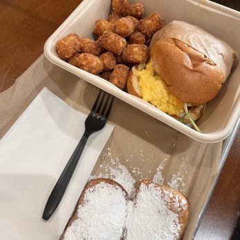 Beignet Spot - B Spot breakfast sandwich with scrambled egg and sausage. All the plates come with 2 beignets. - Coffee & Tea Near Me - Riverside, California