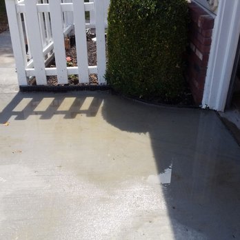 Sellers Concrete Company - notice the concrete on fence... water now at .75 inch - Masonry/Concrete Near Me - Amherst, Ohio Sellers Concrete Company - notice the concrete on fence... water now at .75 inch - Masonry/Concrete Near Me - Amherst, Ohio