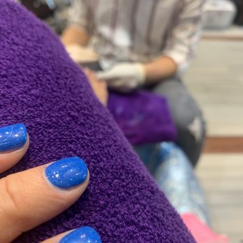 Nails Of Michigan - Beautiful dipped nails in my favorite blue. Matching shellac pedi in progress! Jason provides outstanding service every time. - Nail Salons Near Me - Clarkston, Michigan Nails Of Michigan - Beautiful dipped nails in my favorite blue. Matching shellac pedi in progress! Jason provides outstanding service every time. - Nail Salons Near Me - Clarkston, Michigan