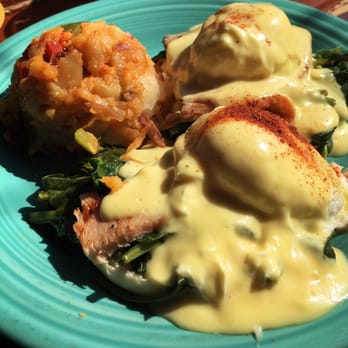 Hobbit Cafe - The poached egg with hollandaise sauce over smoked turkey, steamed spinach and English muffins. Simply divine! - Burgers Near Me - Houston, Texas Hobbit Cafe - The poached egg with hollandaise sauce over smoked turkey, steamed spinach and English muffins. Simply divine! - Burgers Near Me - Houston, Texas