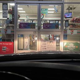 the front of a convenience store the front of a convenience store
